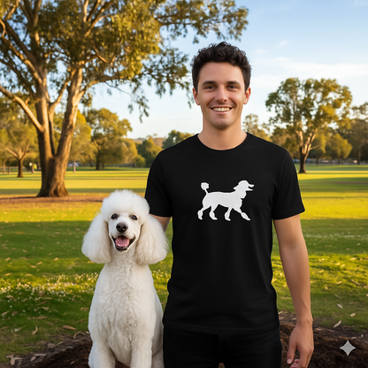 Man wearing a black t-shirt with a white poodle design, standing next to a white poodle in a park.